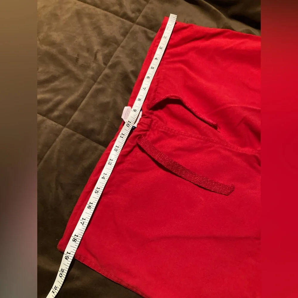 Red Ohio State Buckeyes scrub pants, size medium, small stain under pocket